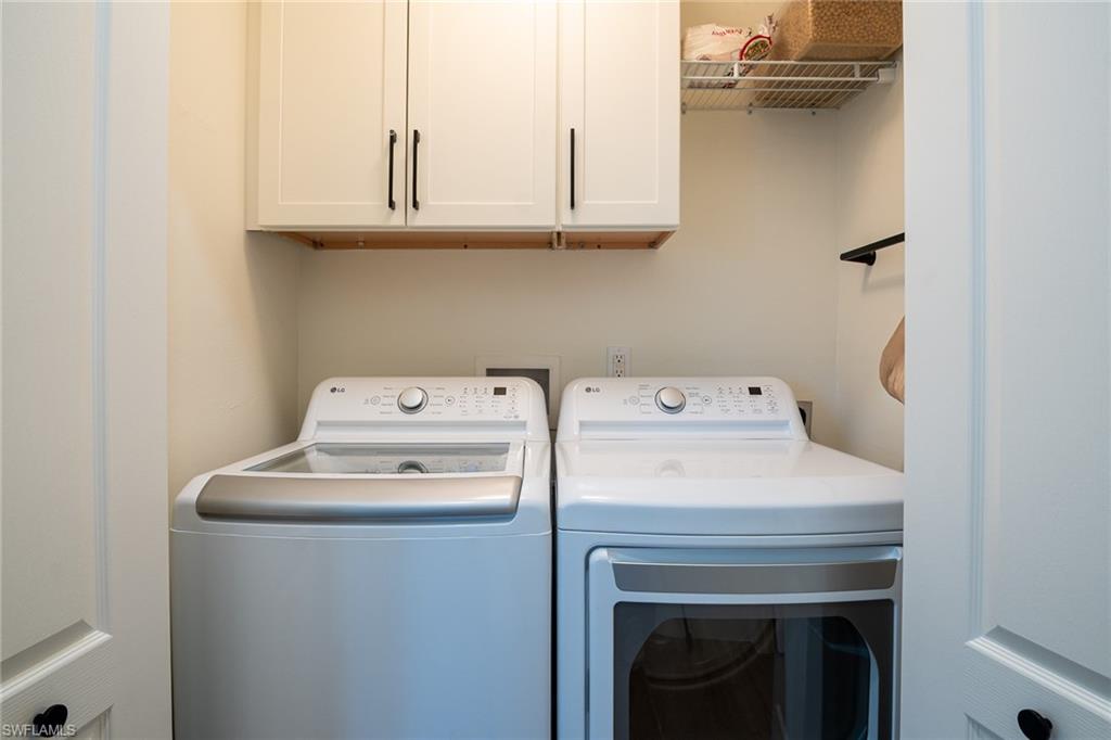 21441 Knighton Run Estero, FL 33928 - Photo 27 of 50 a utility room with dryer and washer