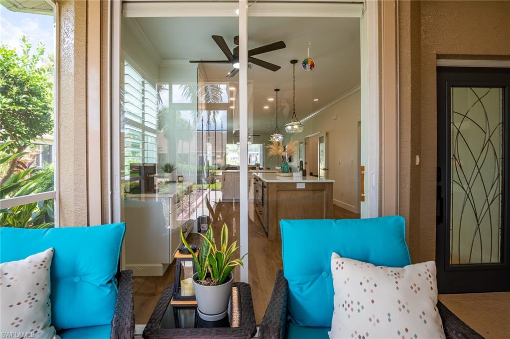 21441 Knighton Run Estero, FL 33928 - Photo 32 of 50 a view of a dining room with furniture window and outside view