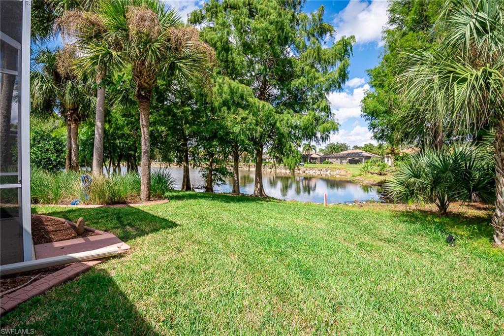 21441 Knighton Run Estero, FL 33928 - Photo 39 of 50 a view of backyard with green space