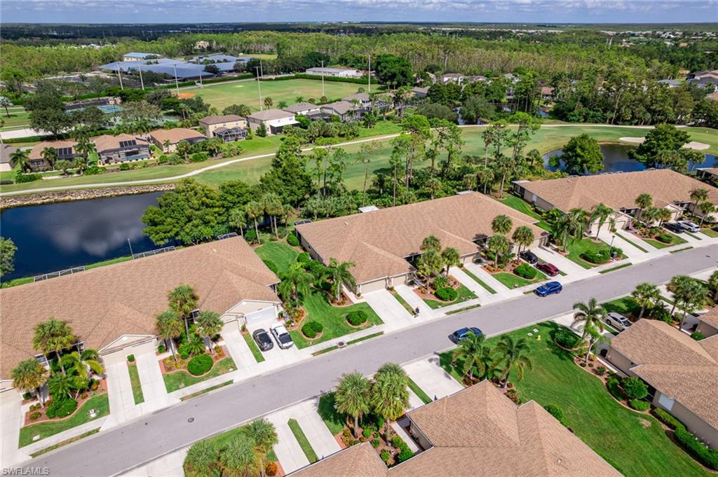 21441 Knighton Run Estero, FL 33928 - Photo 42 of 50 an aerial view of a house with a garden