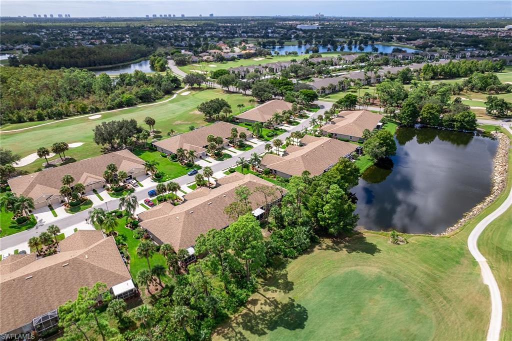 21441 Knighton Run Estero, FL 33928 - Photo 47 of 50 an aerial view of a city with lots of residential buildings