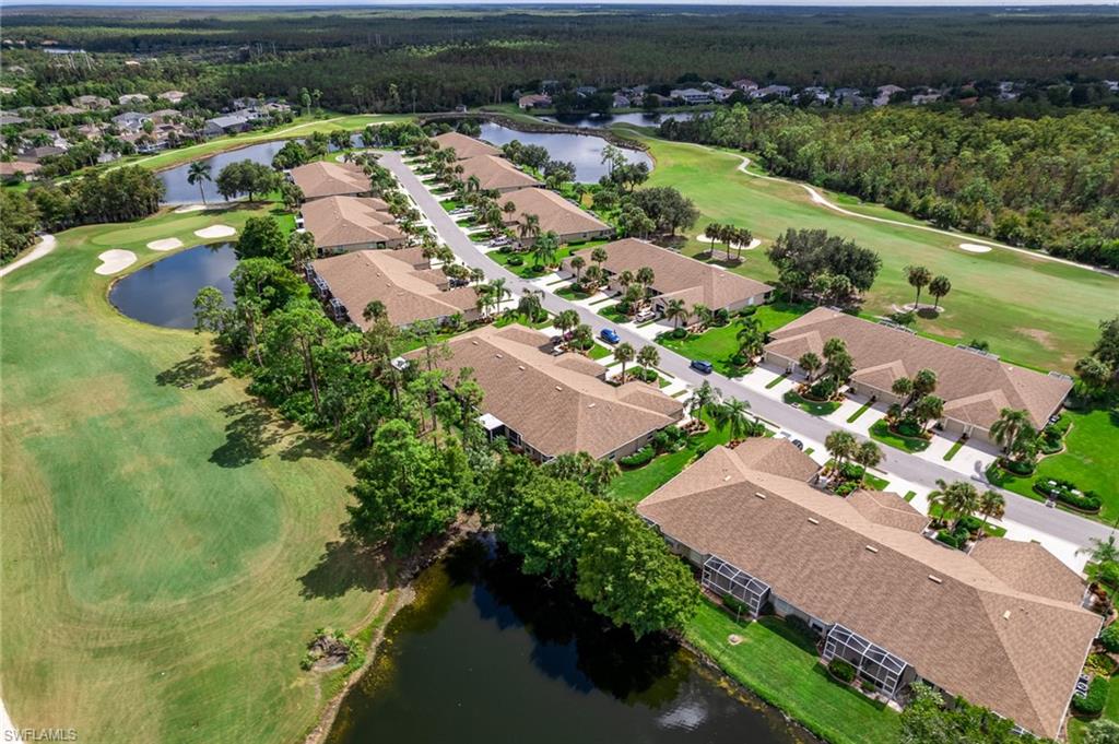 21441 Knighton Run Estero, FL 33928 - Photo 49 of 50 an aerial view of residential houses with outdoor space and river