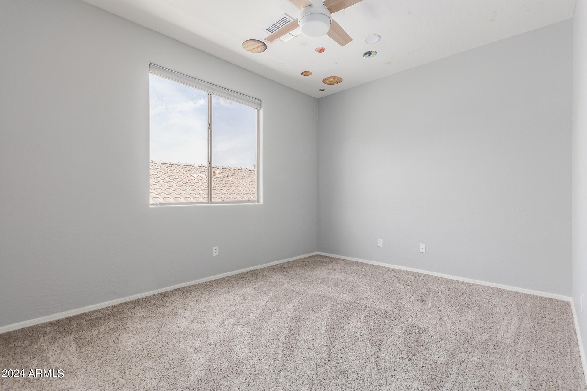 2929 West Silver Fox Way Phoenix, AZ 85045 - Photo 22 of 25 an empty room with a window