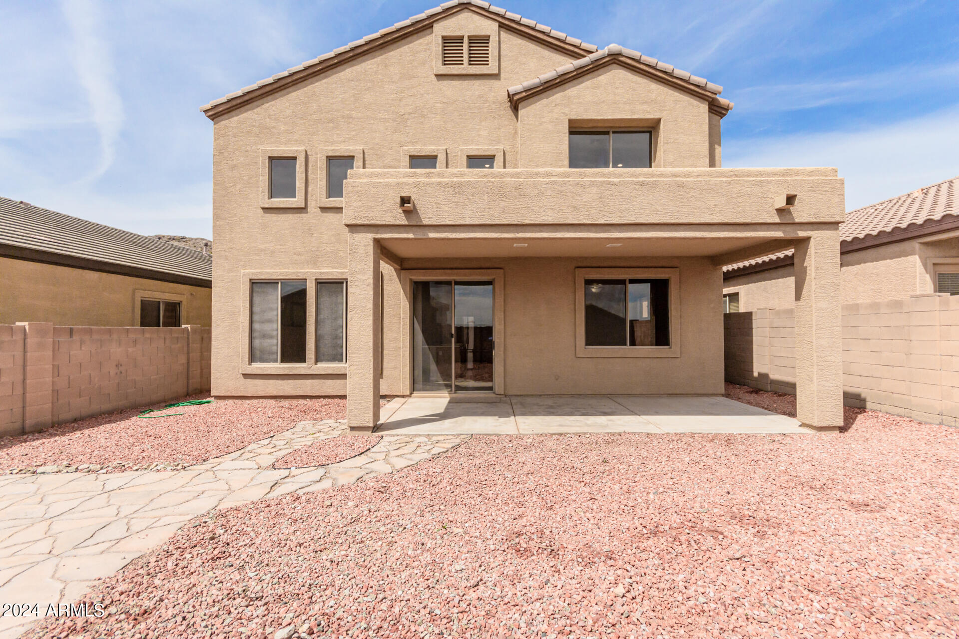 2929 West Silver Fox Way Phoenix, AZ 85045 - Photo 23 of 25 a front view of a house with a yard