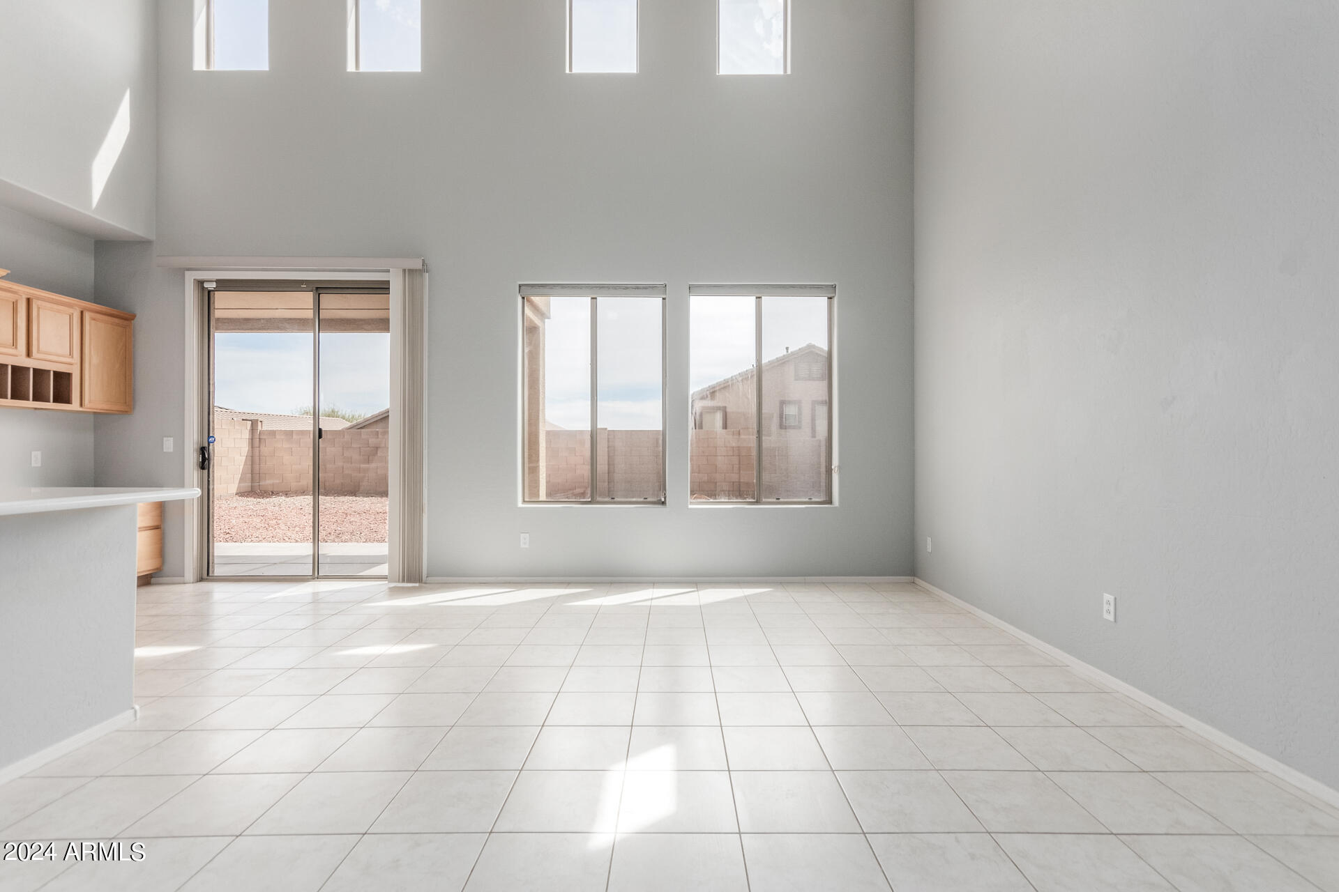 2929 West Silver Fox Way Phoenix, AZ 85045 - Photo 10 of 25 a view of an empty room with a window