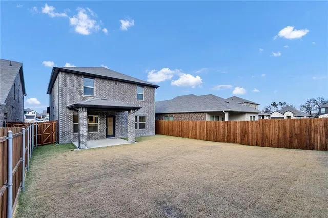 a view of a house with a garage