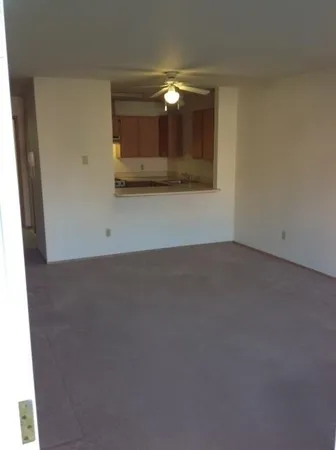 an empty room with a bathroom