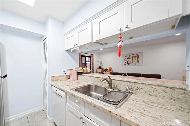 a dining room with furniture wooden floor and a rug