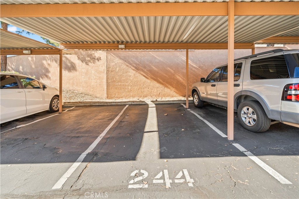 10655 Lemon Avenue, Unit 3107 Rancho Cucamonga, CA 91737 - Photo 29 of 55 a view of a parking space with car parked