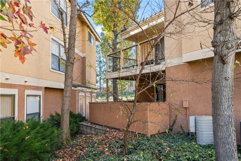 10655 Lemon Avenue, Unit 3107 Rancho Cucamonga, CA 91737 - Photo 30 of 55 a view of a house with a yard