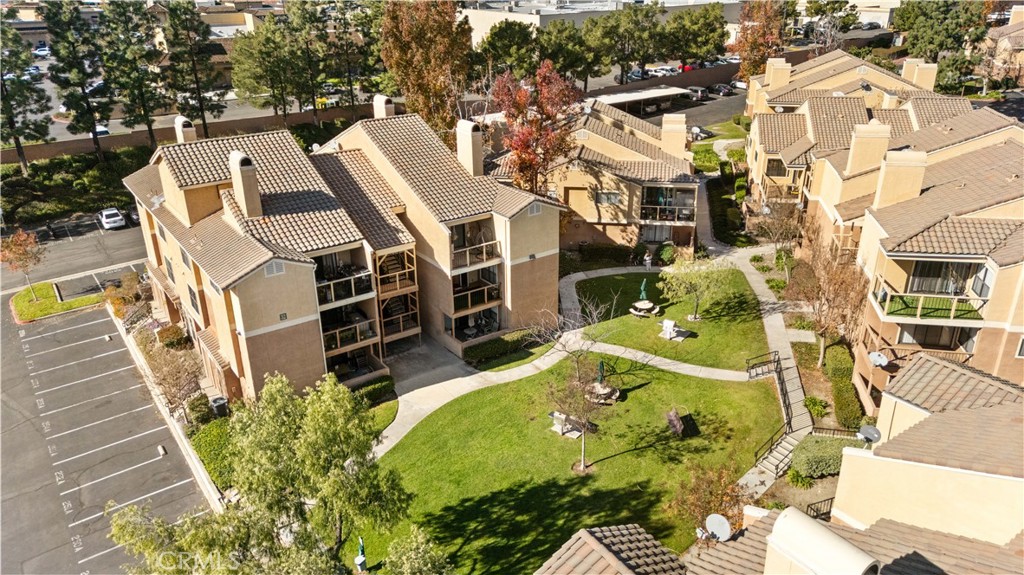 10655 Lemon Avenue, Unit 3107 Rancho Cucamonga, CA 91737 - Photo 42 of 55 an aerial view of a house with a yard