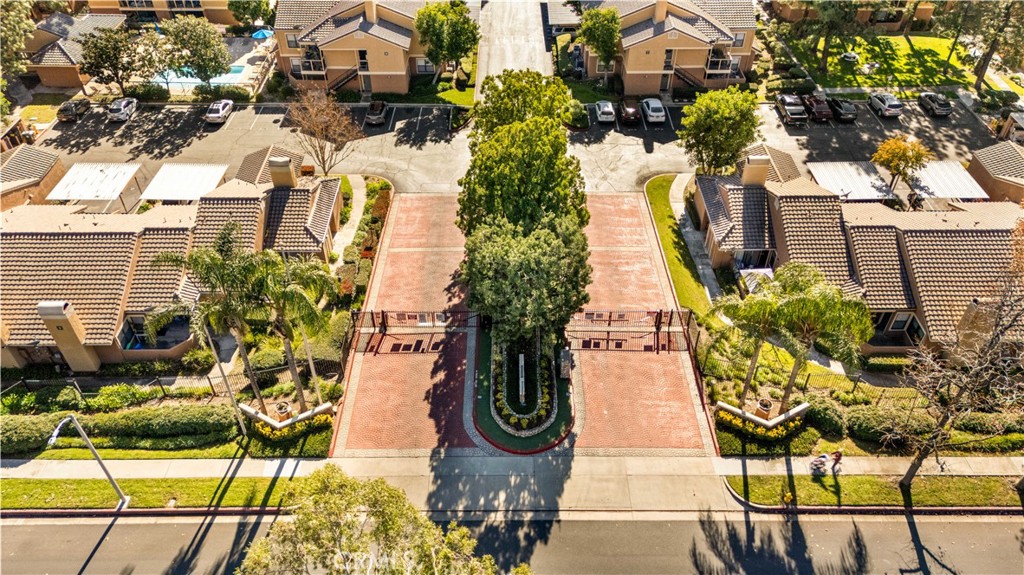 10655 Lemon Avenue, Unit 3107 Rancho Cucamonga, CA 91737 - Photo 44 of 55 an aerial view of residential houses with outdoor space