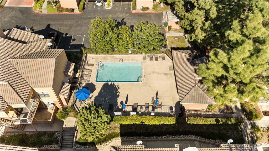 10655 Lemon Avenue, Unit 3107 Rancho Cucamonga, CA 91737 - Photo 47 of 55 an aerial view of residential houses with outdoor space