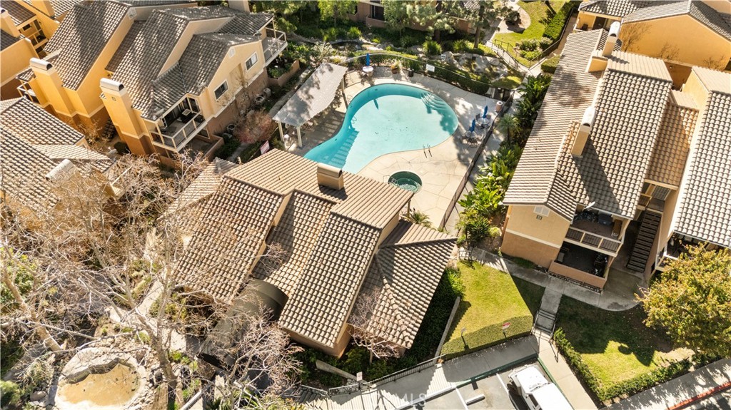 10655 Lemon Avenue, Unit 3107 Rancho Cucamonga, CA 91737 - Photo 48 of 55 an aerial view of a house with a yard