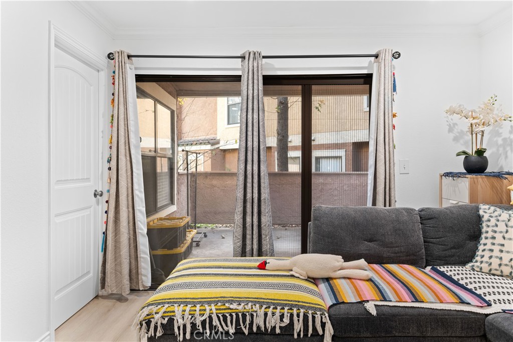 10655 Lemon Avenue, Unit 3107 Rancho Cucamonga, CA 91737 - Photo 8 of 55 a bedroom with a bed and a large window