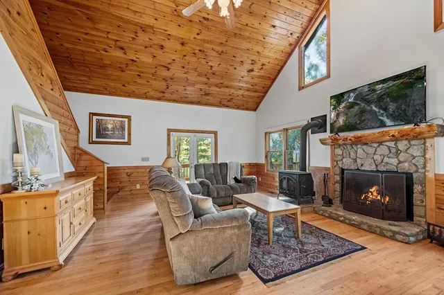 a bathroom with a sink toilet and mirror