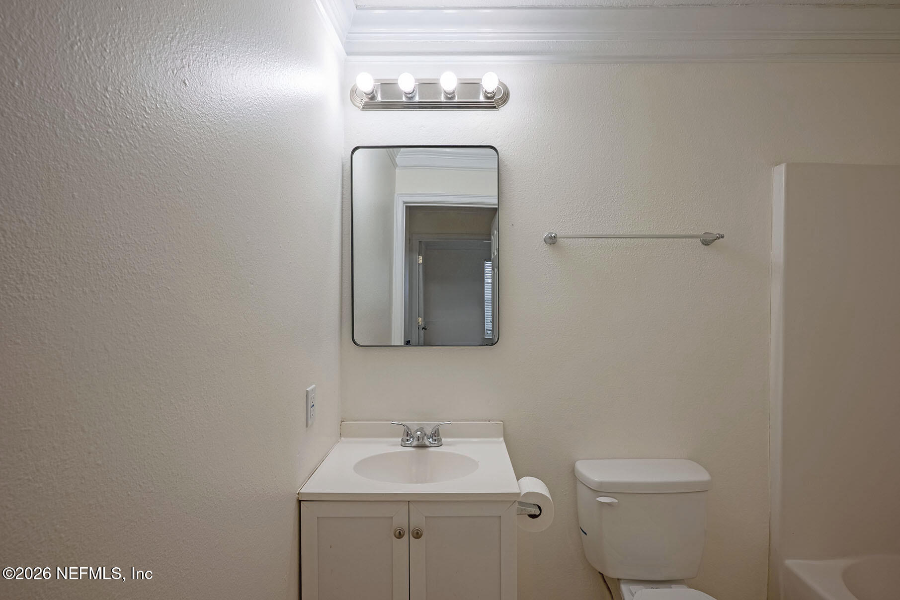 430 Southwest Jasmine Avenue Keystone Heights, FL 32656 - Photo 32 of 37 a bathroom with a toilet a sink and mirror