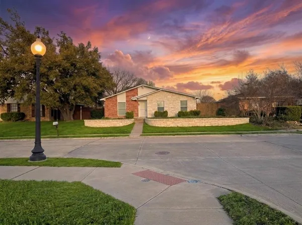 a view of a house with a big yard