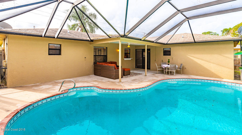 731 Raleigh Road Southeast Palm Bay, FL 32909 - Photo 30 of 36 a view of patio area of house