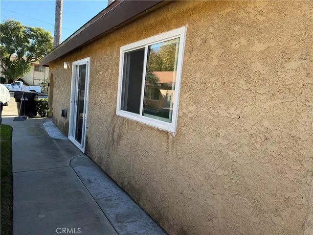 a backyard of a house with seating space