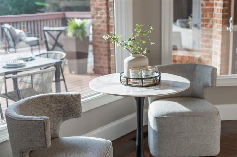 3505 Watson Road Cumming, GA 30028 - Photo 11 of 87 a dining room with furniture and wooden floor