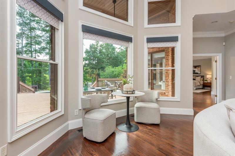 3505 Watson Road Cumming, GA 30028 - Photo 14 of 87 a living room with furniture and a large window