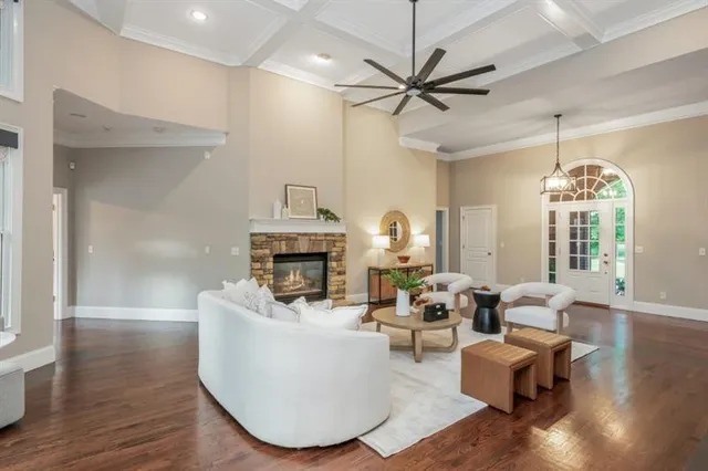 a kitchen with stainless steel appliances granite countertop a refrigerator and a stove