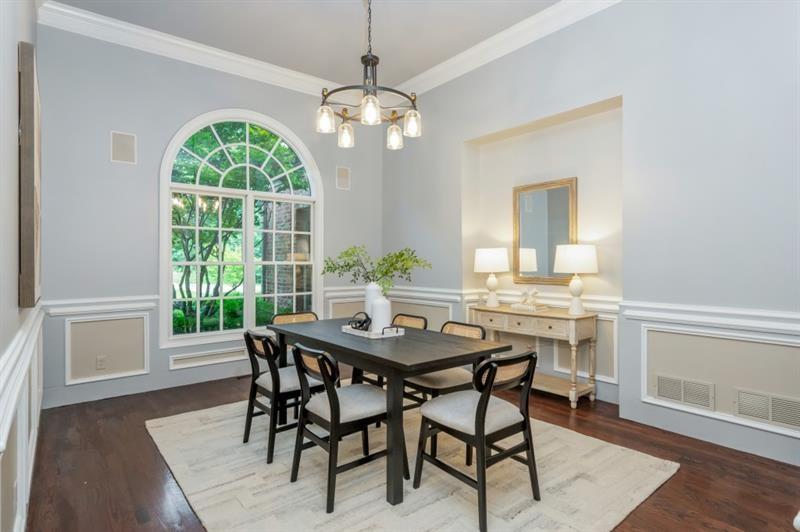 3505 Watson Road Cumming, GA 30028 - Photo 42 of 87 a view of a dining room with furniture window and wooden floor