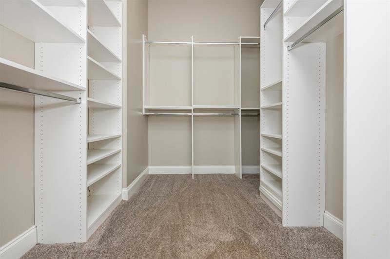 3505 Watson Road Cumming, GA 30028 - Photo 52 of 87 a view of an empty walk in closet