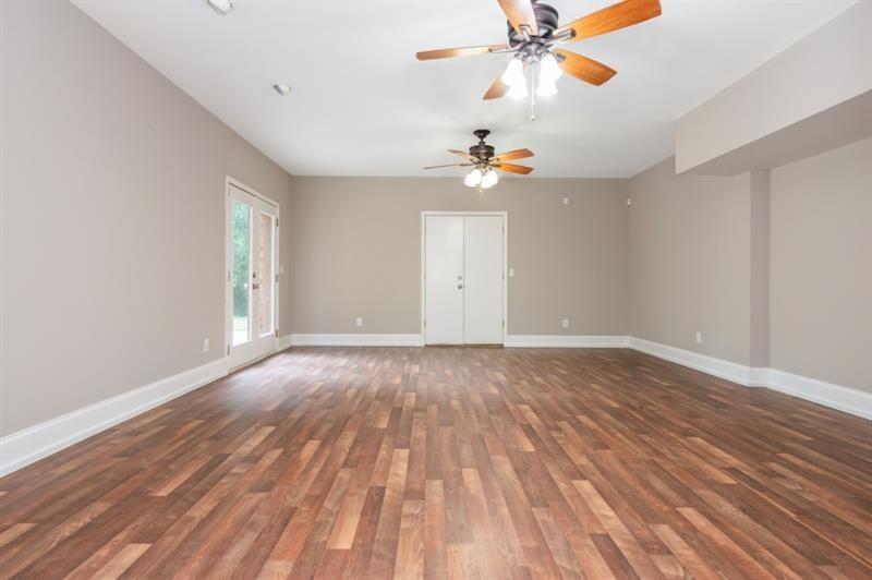 3505 Watson Road Cumming, GA 30028 - Photo 67 of 87 wooden floor in an empty room with a window