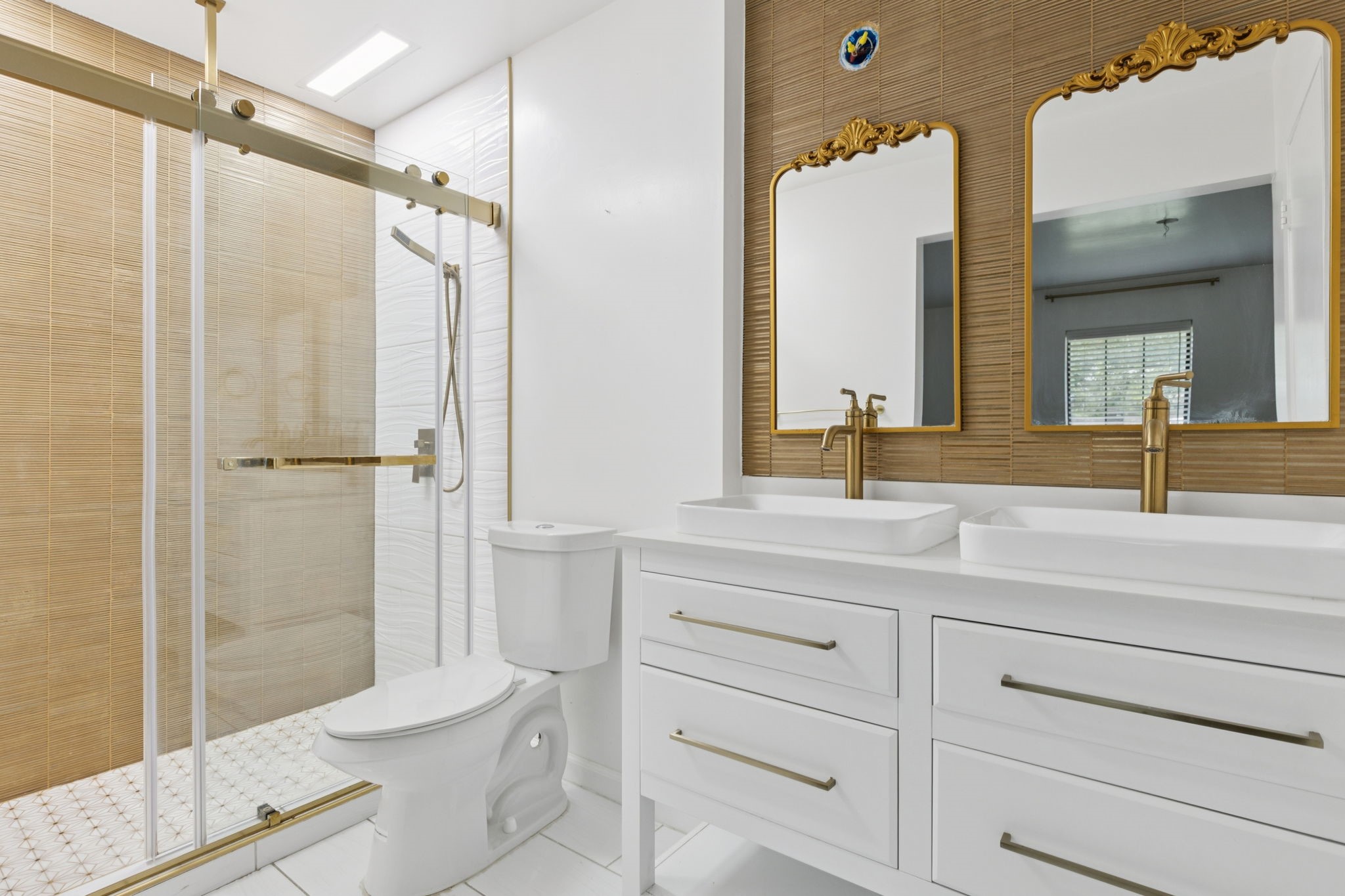 910 Via Valencia Mesquite, TX 75150 - Photo 16 of 23 a bathroom with a sink a toilet and shower