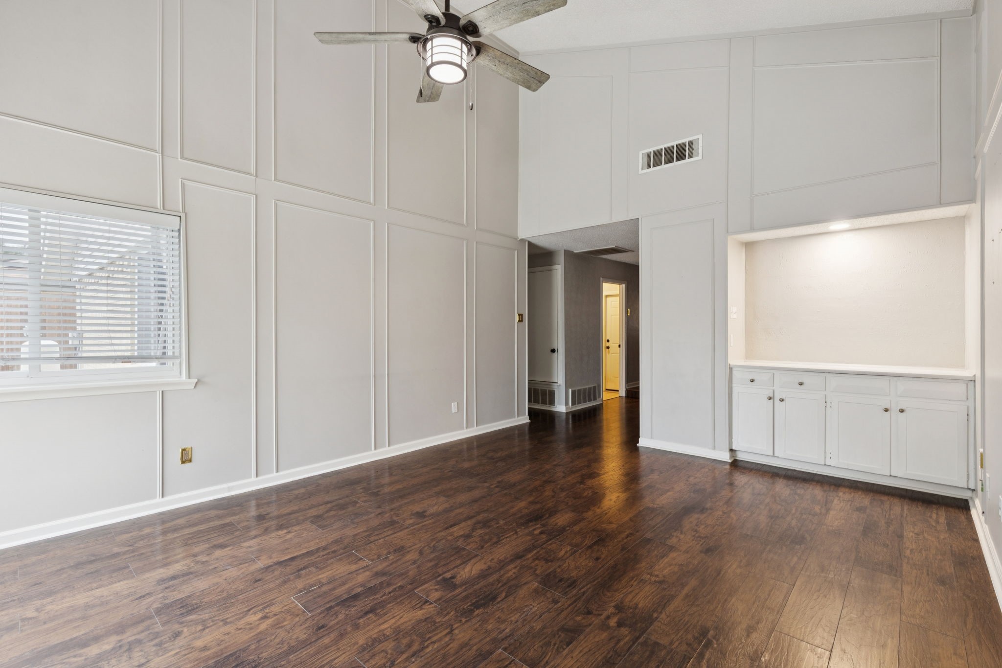 910 Via Valencia Mesquite, TX 75150 - Photo 6 of 23 a view of an empty room with wooden floor