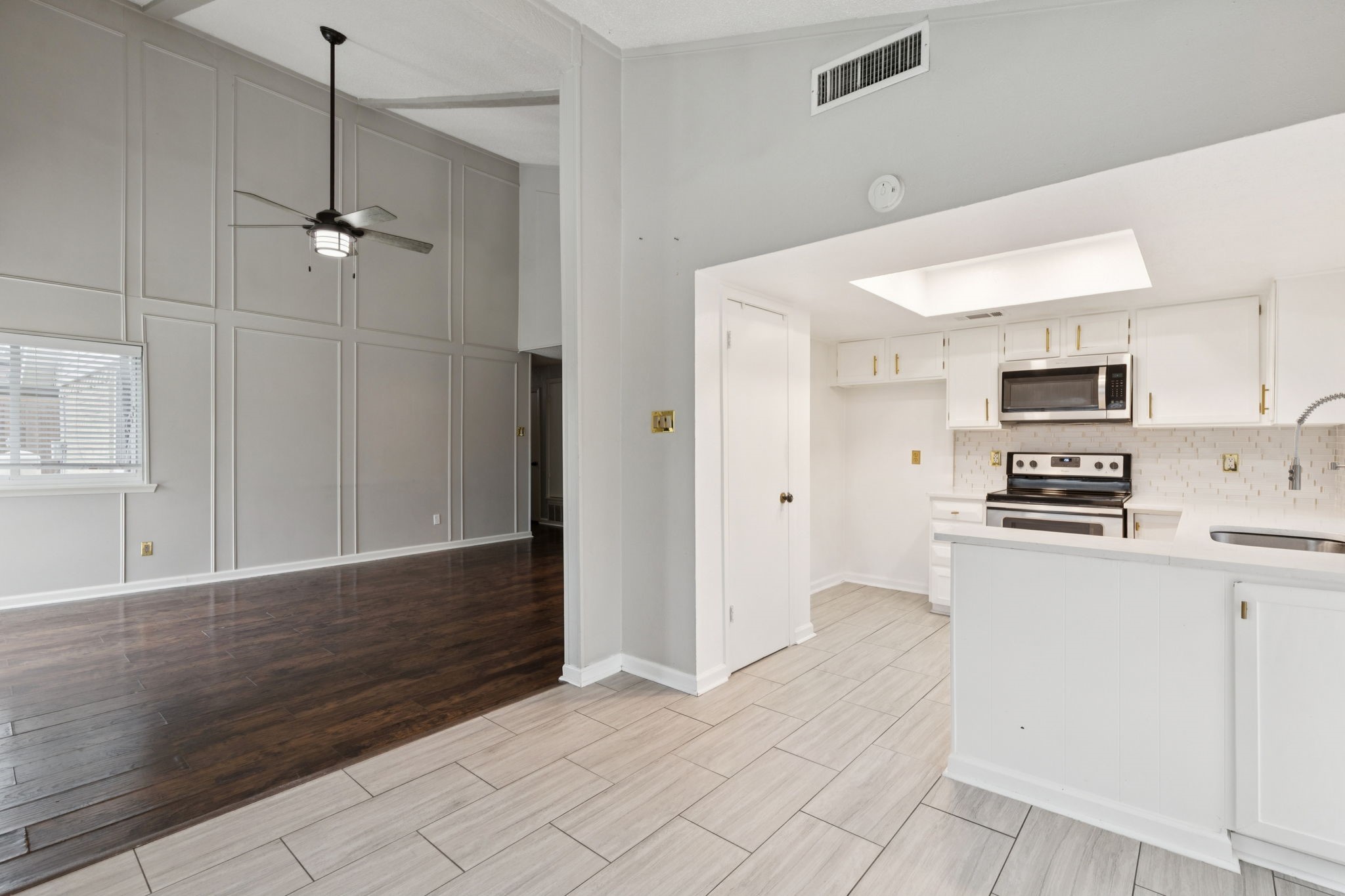 910 Via Valencia Mesquite, TX 75150 - Photo 9 of 23 a kitchen with stainless steel appliances a refrigerator sink and microwave