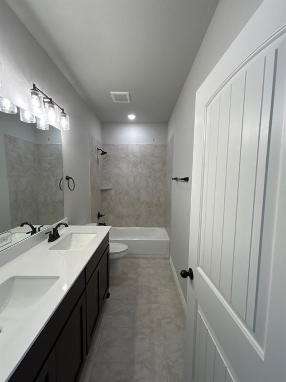 8779 County Road 623 Blue Ridge, TX 75424 - Photo 10 of 12 a bathroom with a tub sink vanity granite and shower