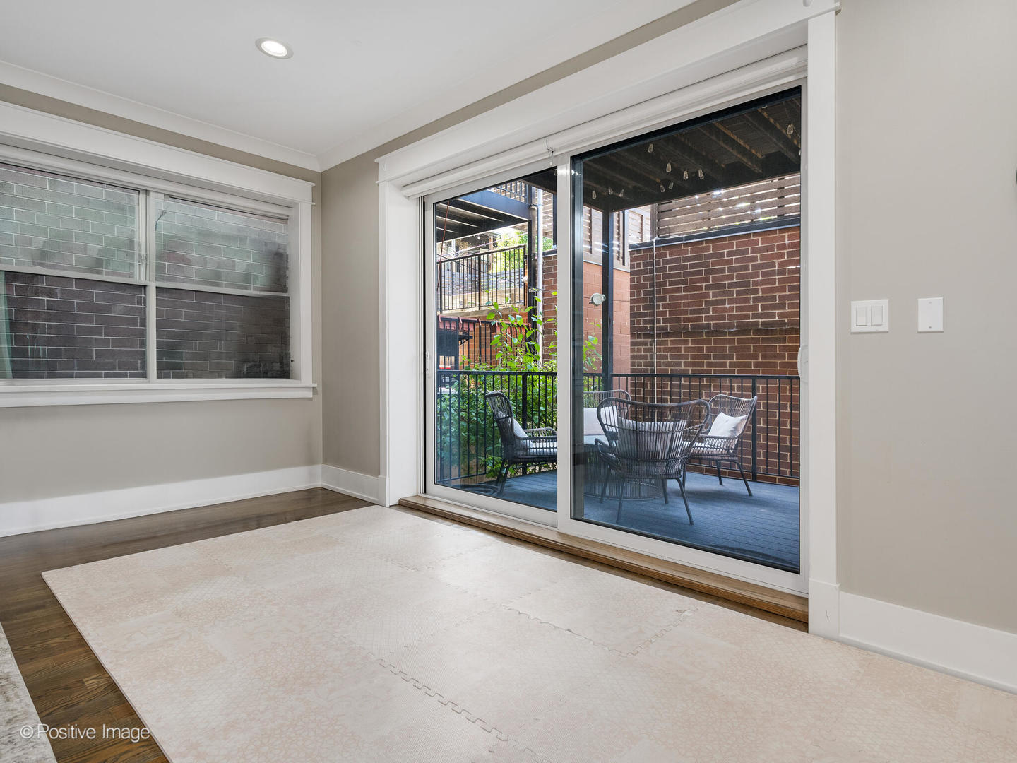 2315 West Roscoe Street, Unit 1 Chicago, IL 60618 - Photo 18 of 37 a view of an empty room with a window
