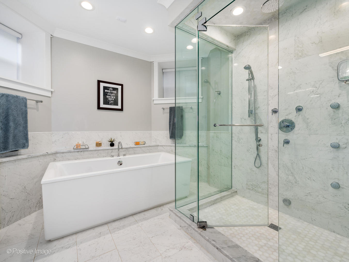 2315 West Roscoe Street, Unit 1 Chicago, IL 60618 - Photo 26 of 37 a bathroom with a bathtub and a shower