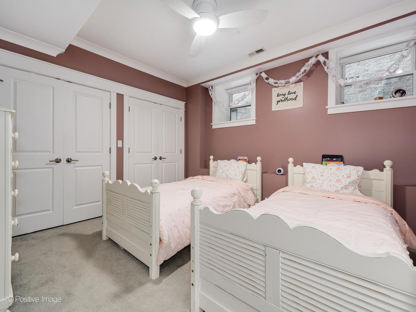 2315 West Roscoe Street, Unit 1 Chicago, IL 60618 - Photo 27 of 37 a room with two white bed