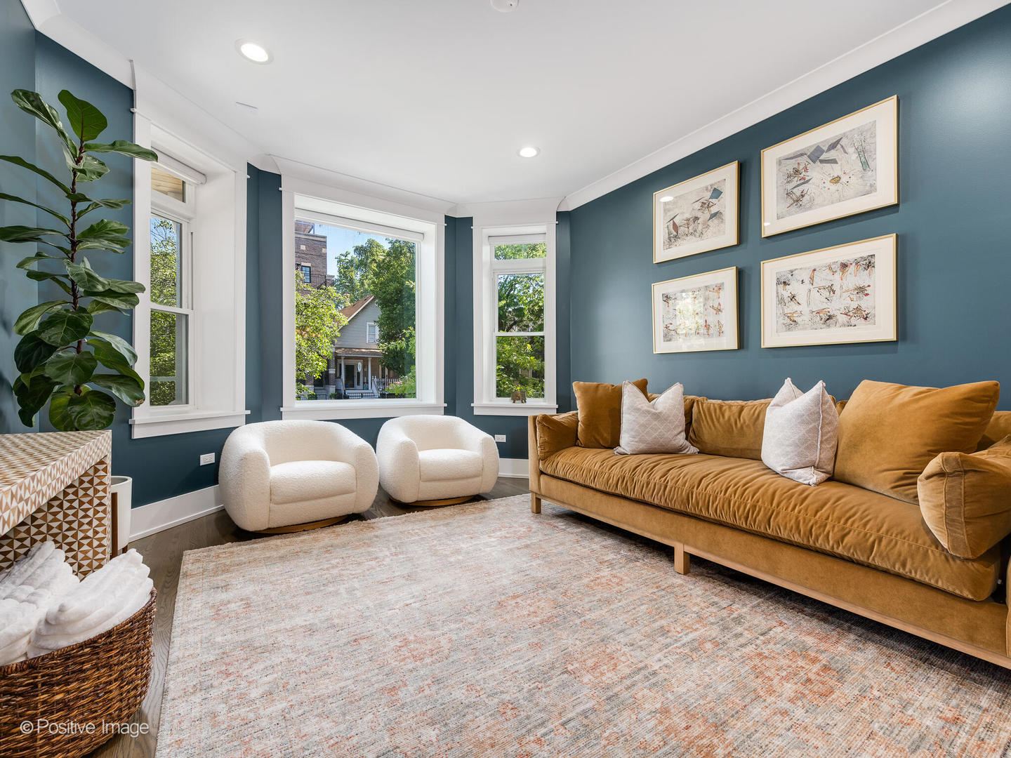 2315 West Roscoe Street, Unit 1 Chicago, IL 60618 - Photo 3 of 37 a living room with furniture and large windows