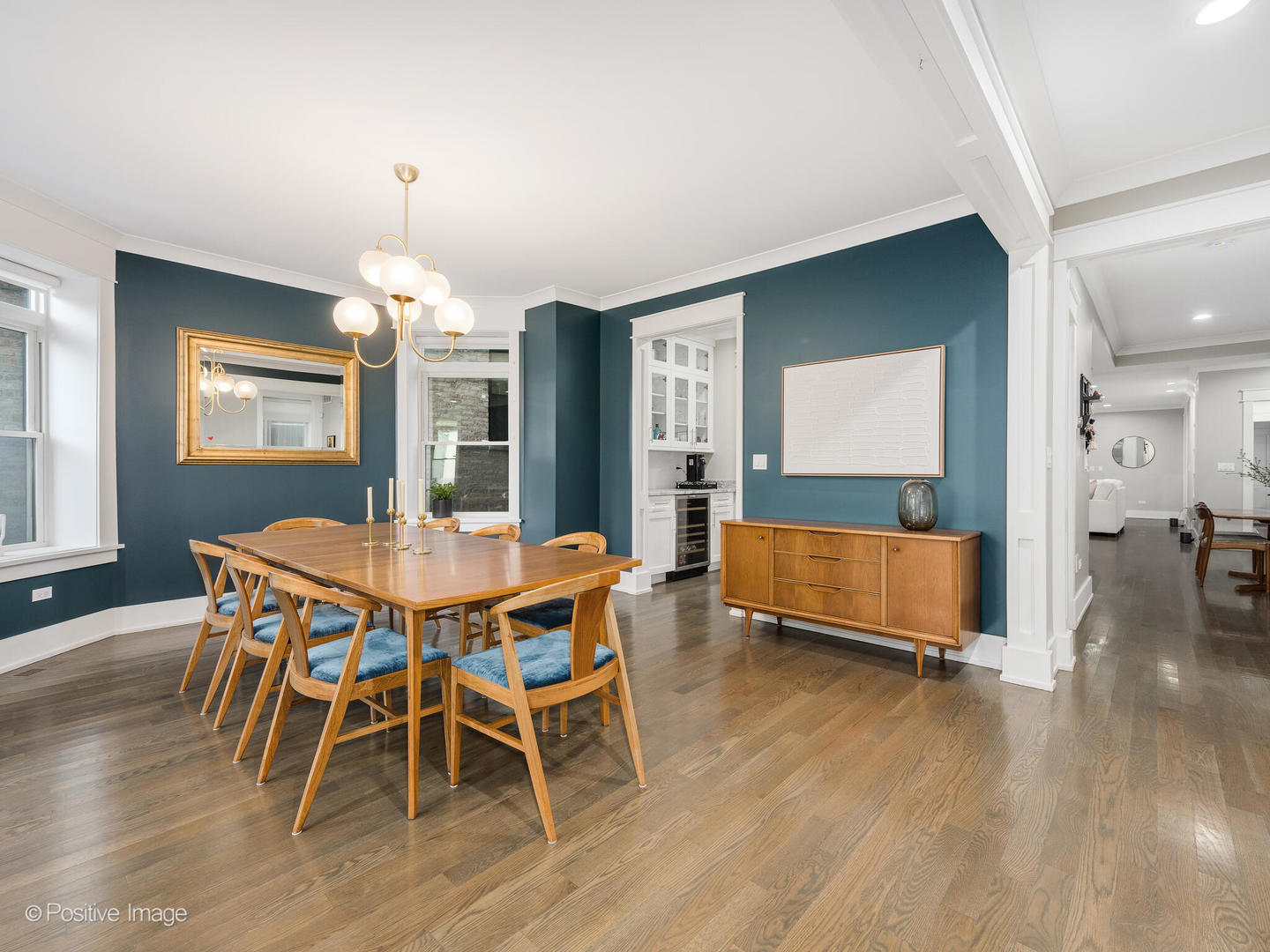 2315 West Roscoe Street, Unit 1 Chicago, IL 60618 - Photo 7 of 37 a view of a dining room with furniture and wooden floor