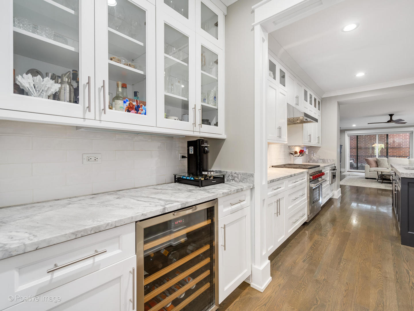 2315 West Roscoe Street, Unit 1 Chicago, IL 60618 - Photo 8 of 37 a kitchen with cabinets and a stove