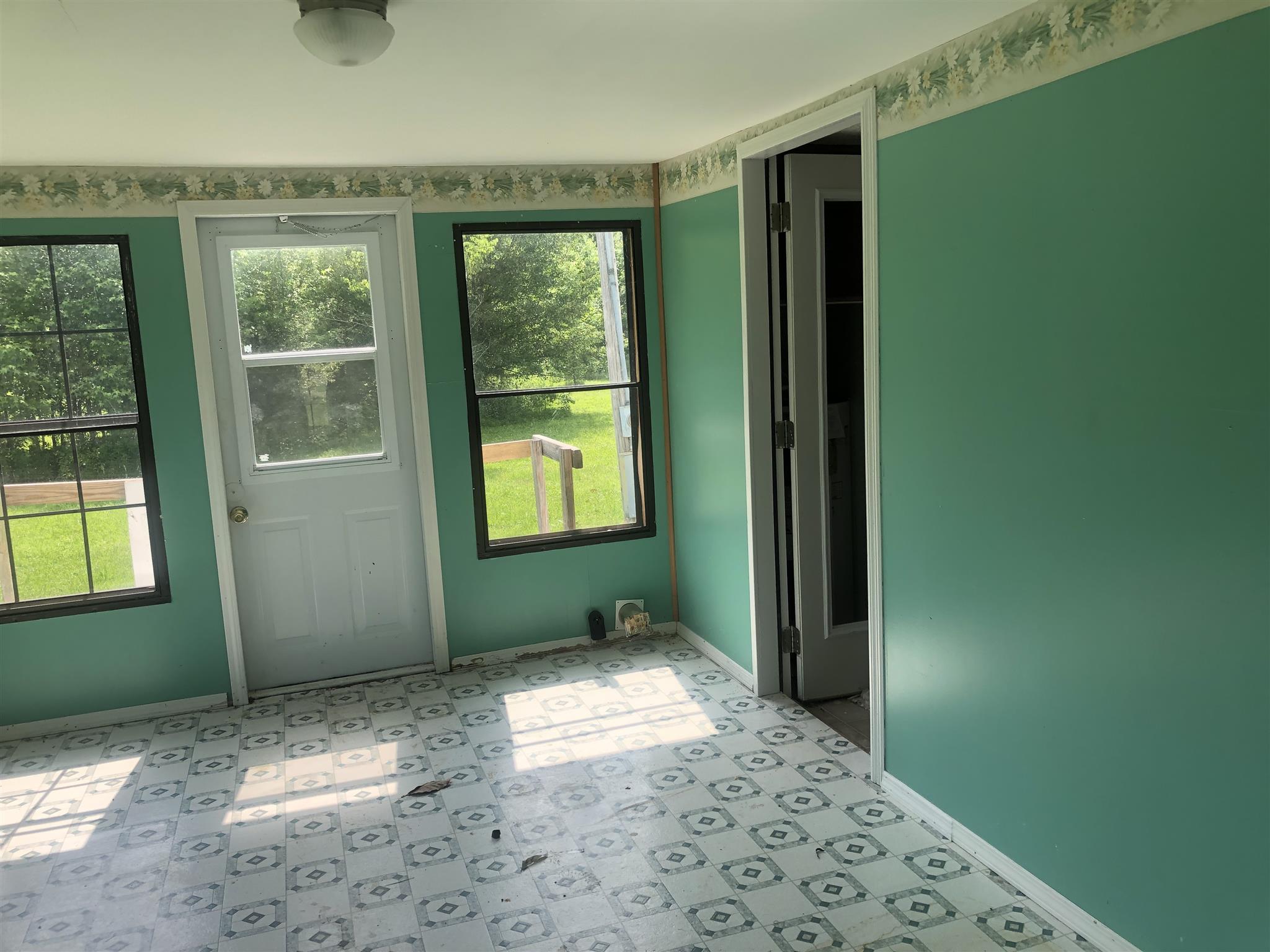2566 Chambliss Road Pleasant View, TN 37146 - Photo 7 of 7 a view of an empty room with a window