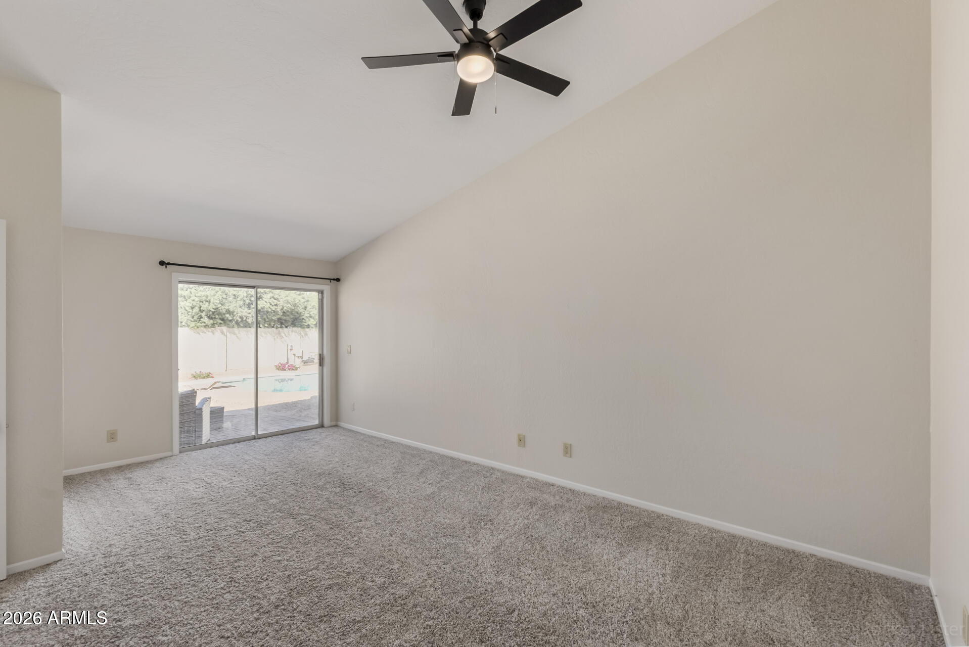 5116 East Wethersfield Road Scottsdale, AZ 85254 - Photo 21 of 53 a view of an empty room with a window
