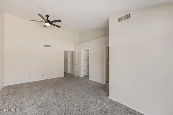 a view of an empty walk in closet