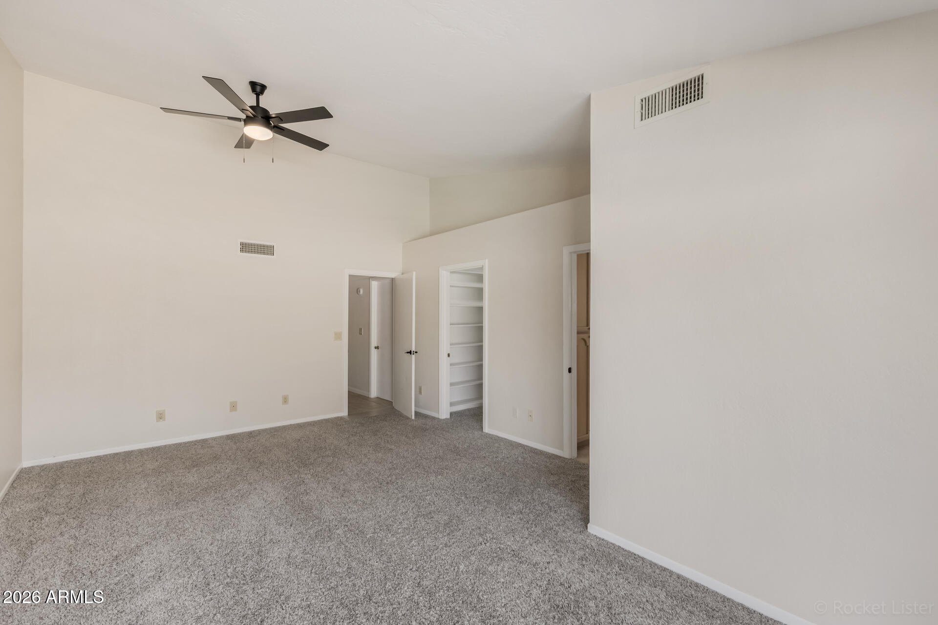 5116 East Wethersfield Road Scottsdale, AZ 85254 - Photo 23 of 53 a view of a room with a ceiling fan