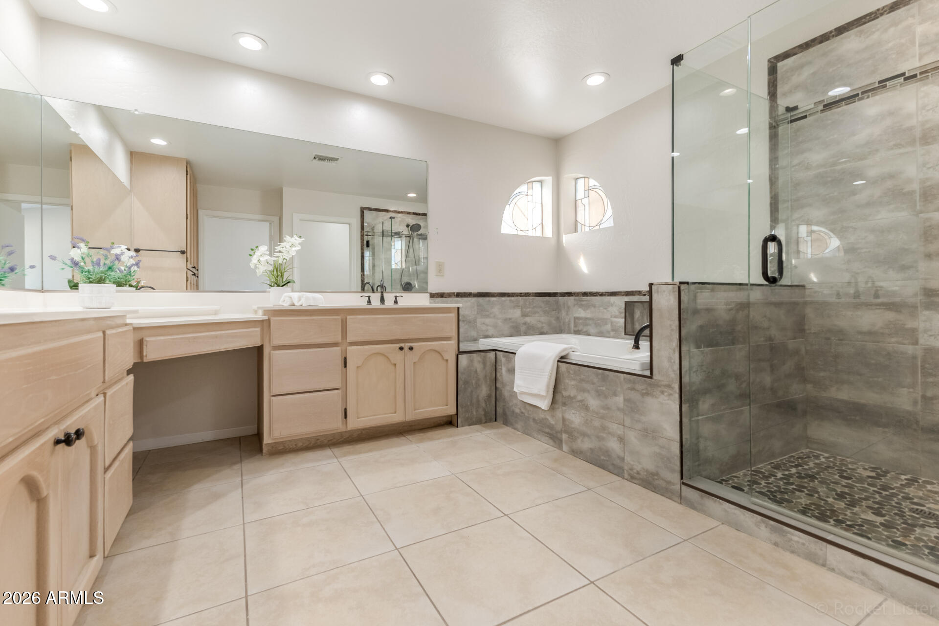 5116 East Wethersfield Road Scottsdale, AZ 85254 - Photo 27 of 53 a large white bathroom with a sink a toilet and shower