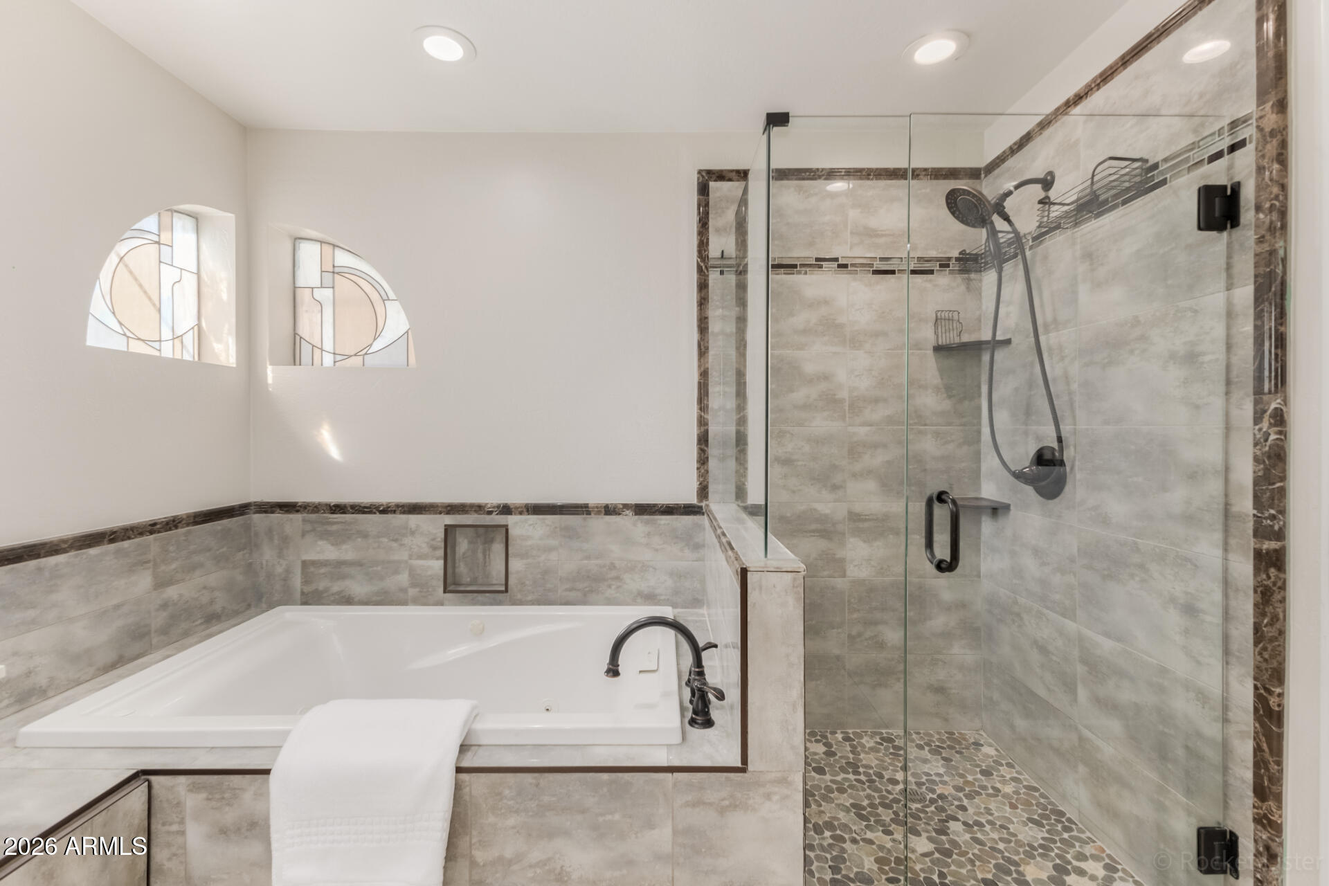 5116 East Wethersfield Road Scottsdale, AZ 85254 - Photo 28 of 53 a bathroom with a bathtub shower sink and mirror