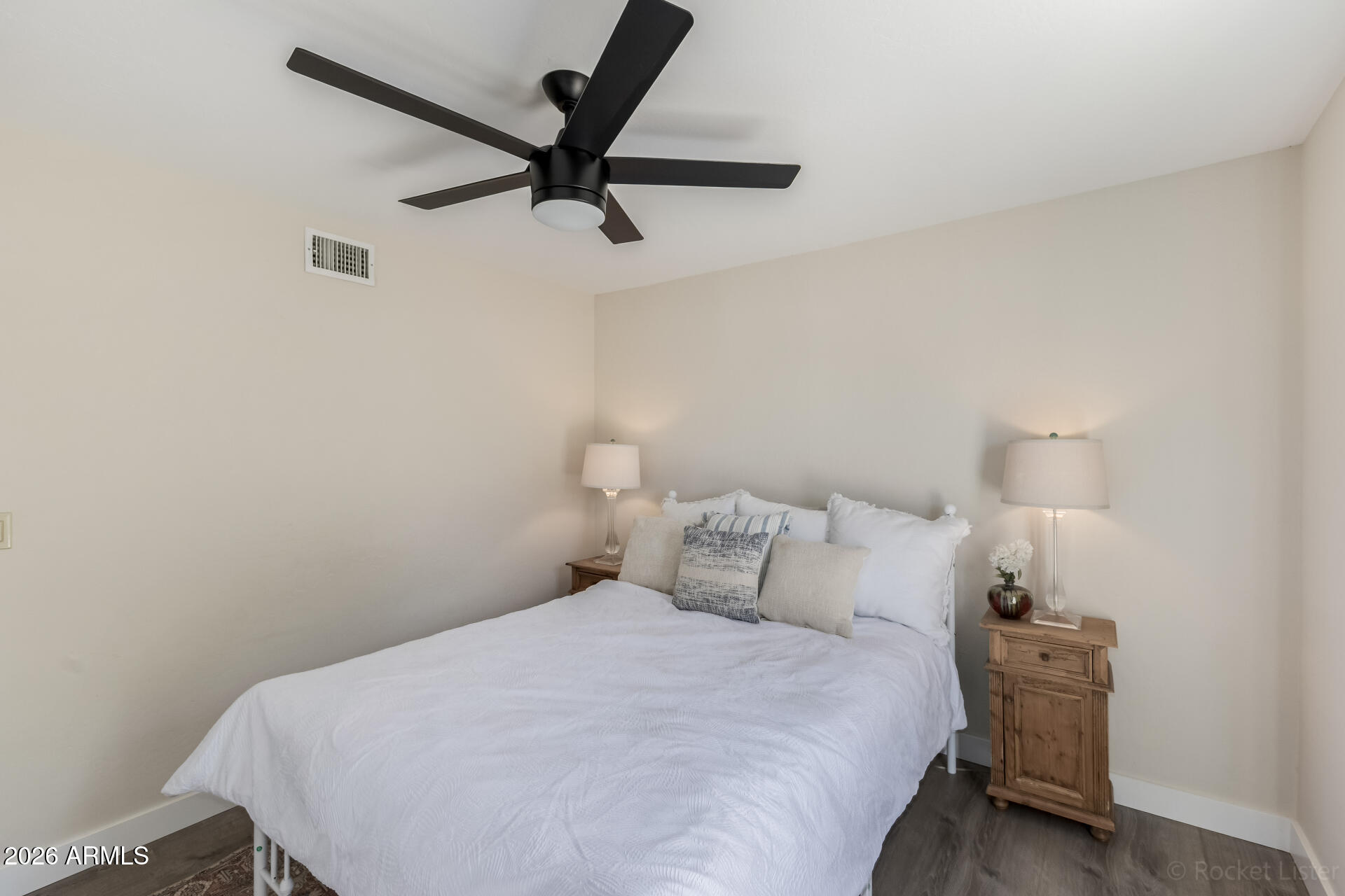 5116 East Wethersfield Road Scottsdale, AZ 85254 - Photo 31 of 53 a bedroom with a bed and a window