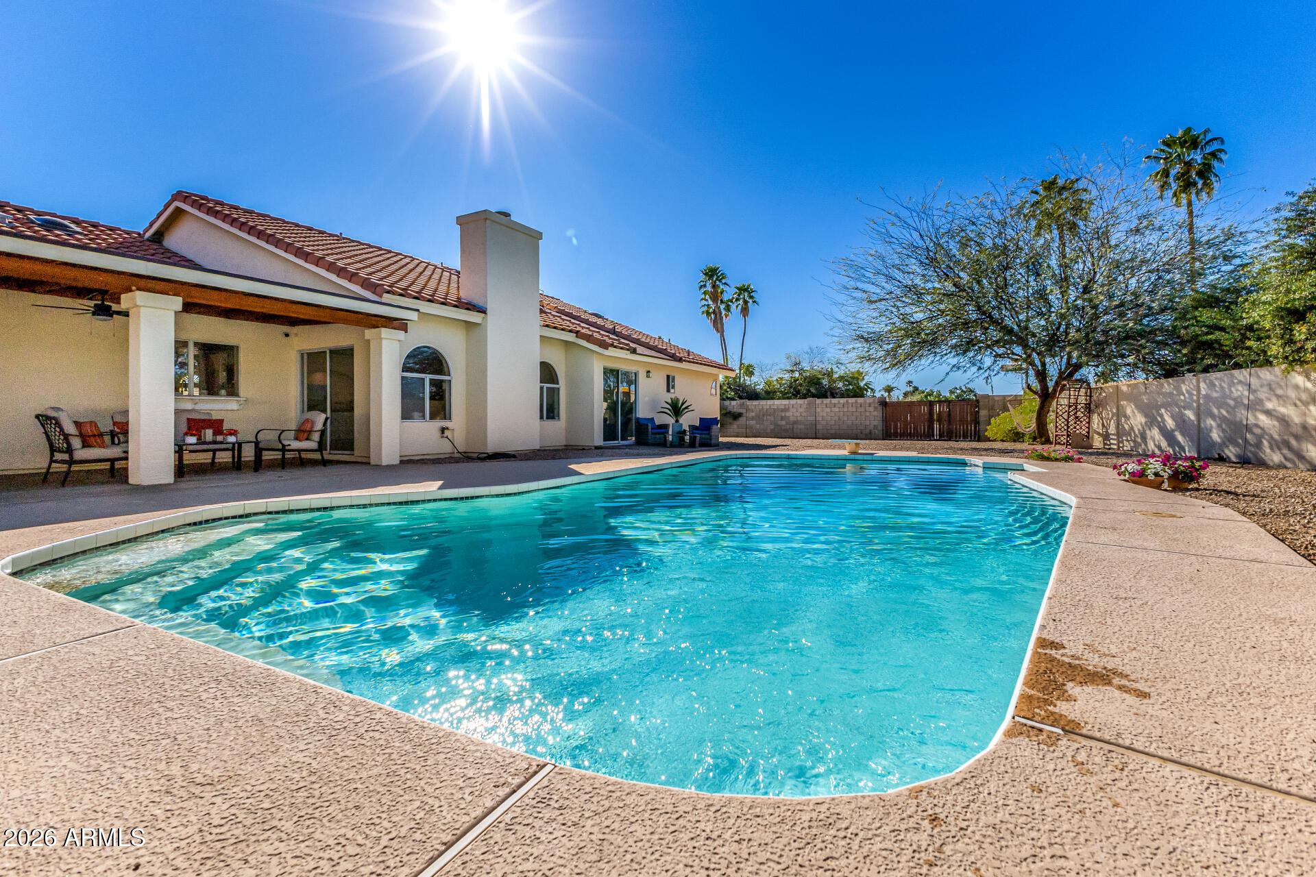 5116 East Wethersfield Road Scottsdale, AZ 85254 - Photo 39 of 53 a view of a house with a yard