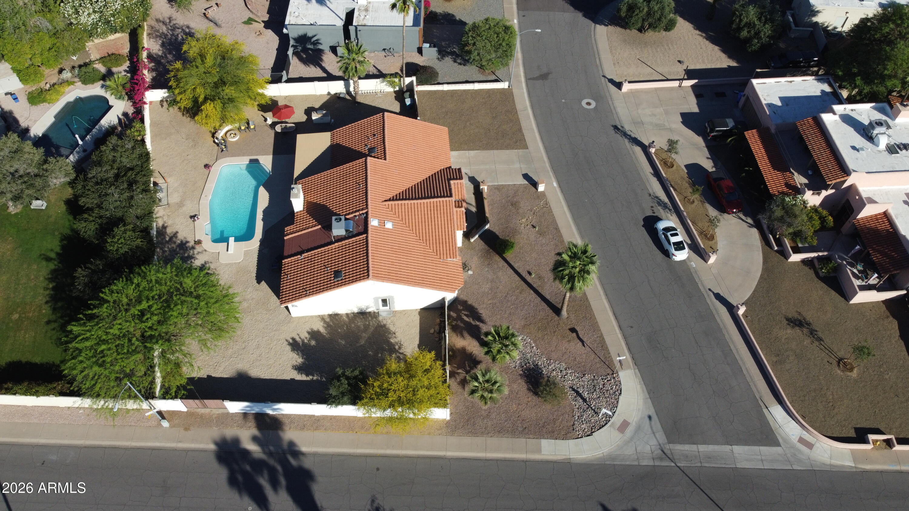 5116 East Wethersfield Road Scottsdale, AZ 85254 - Photo 46 of 53 an aerial view of residential houses with outdoor space