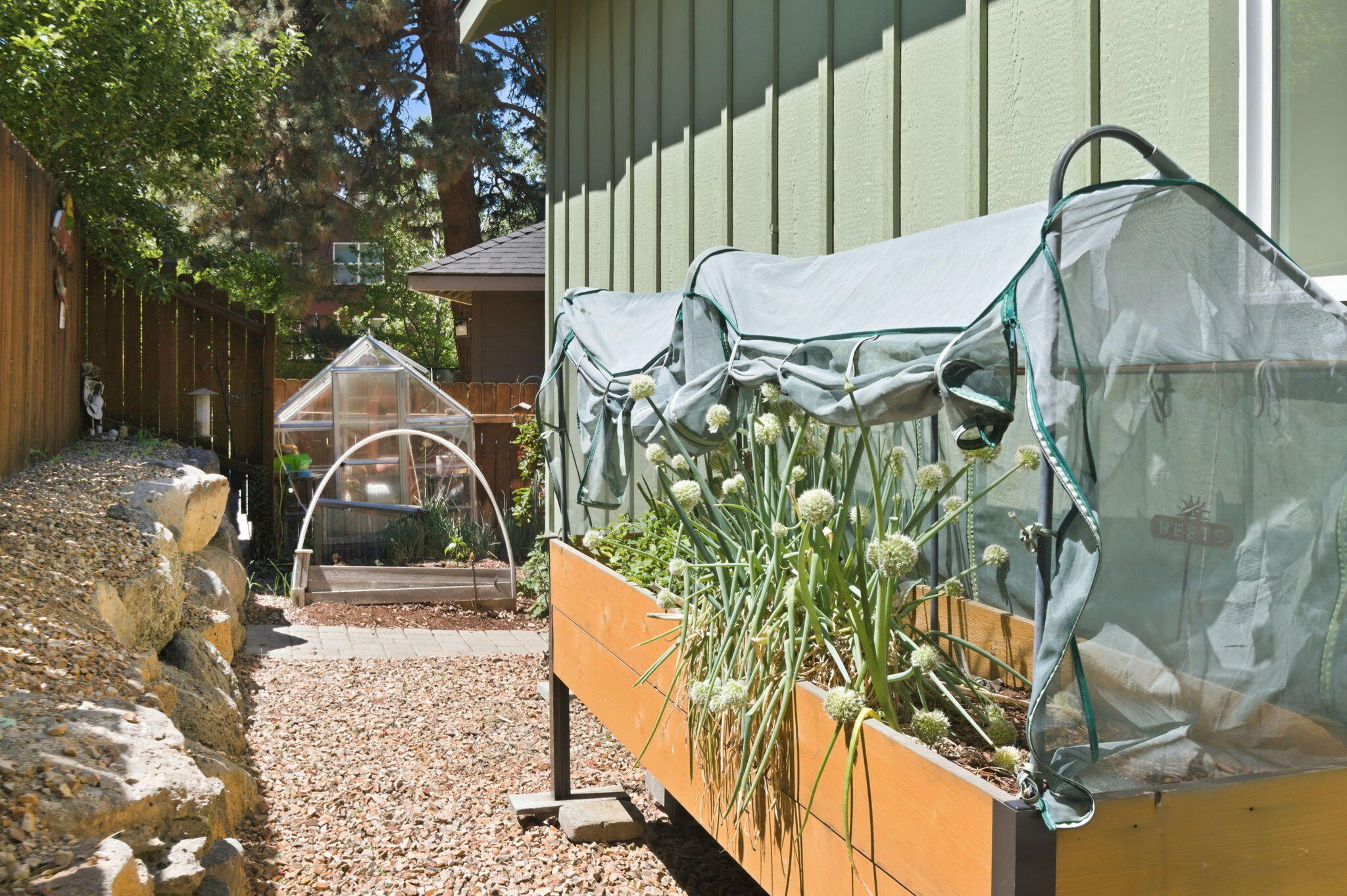 62944 Fresca Street Bend, OR 97703 - Photo 24 of 32 a backyard of a house with table and chairs